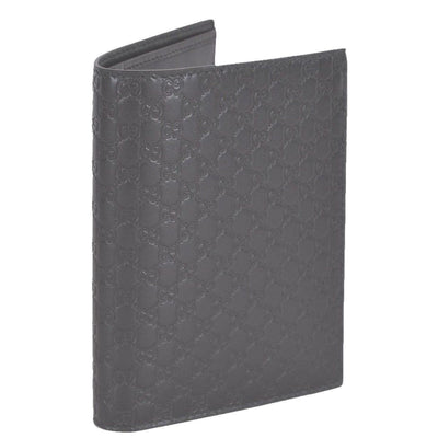 Gucci Mens Dark Brown GG Logo Vertical Passport Holder Microguccissima Soft Leather 496948