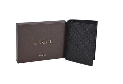 Gucci Mens Nero Black GG Logo Vertical Passport Case Microguccissima Soft Leather 496948