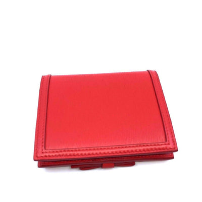 Prada Portafoglio Verticale Fuxia Red Leather Vitello Move Flap Bow Wallet 1MV204